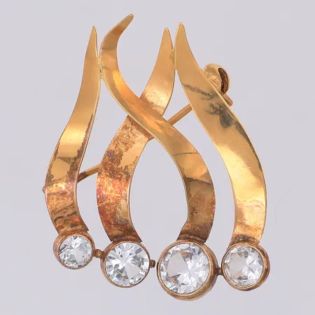 Brosch vita stenar flammor år 1962 30mm x 25mm, 18K Vikt: 2,9 g Skickas med postpaket.