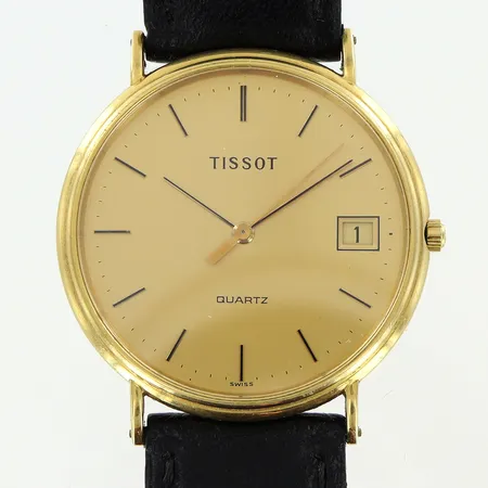 Herrur Tissot 18K quartz Ø33mm, datum, sekundvisare, läderband 23,5cm ej original, i behov av batteribyte, bruttovikt 30,6g, box.