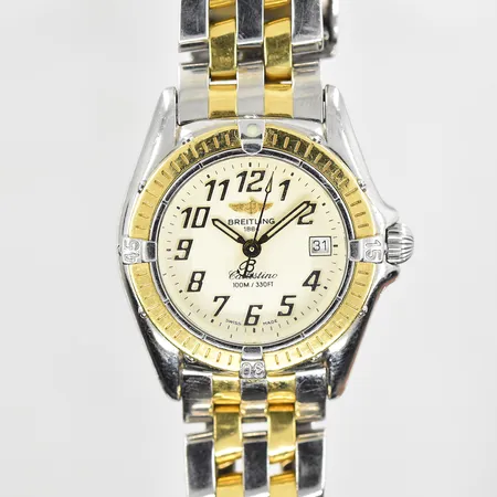 Damur Breitling Callistino stål/guld quartz, datum, safirglas, boett Ø26 mm, serienr D52045.1, refnr 6267, pilotlänk, går ojämnt/ojämn sekundvisning, behov av batteribyte, inga tillbehör.