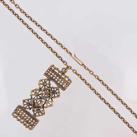 Collier design Pentti Sarpaneva längd 67,5cm hängdel 75mm brons Skickas med postpaket.