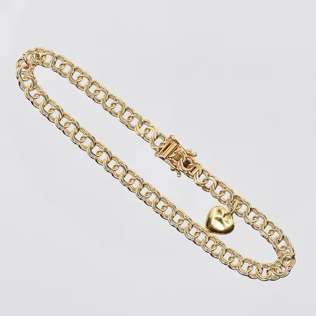 Armband Bismarck med berlock hjärta längd 18½ cm, bredd 4 mm, buckla på hjärta, 18K. Vikt: 8,6 g
