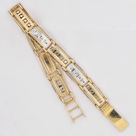 Armband diamanter ca 16x0,005ct 8/8-slipade längd 20,5-21cm bredd 11mm tvåfärgad 14K Vikt: 20,2 g