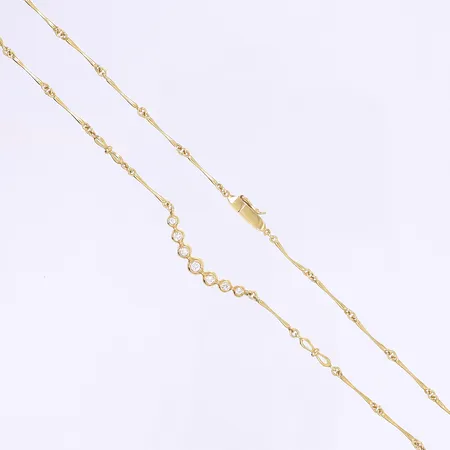 Halscollier med diamanter totalt ca 0,20ctv längd 43cm, bredd 1-5mm, bucklig kedja, ostämplad 18K Vikt: 9,1 g