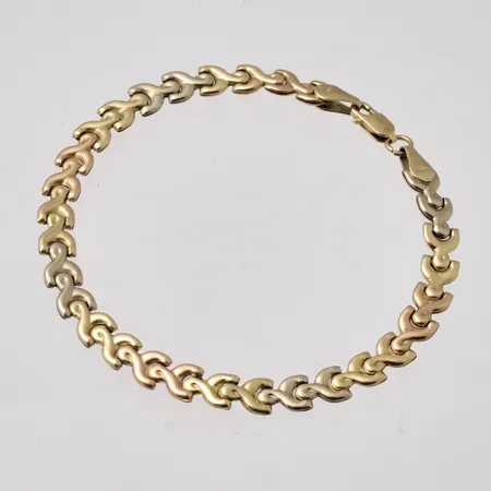 Armband 20,5cm bredd 6,2mm, gult/rött/vittguld, 18K, 7,44g.