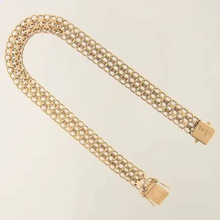 Armband X-länk längd 21cm bredd 8,4mm 18K Vikt: 14,8 g