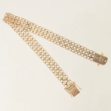 Armband X-länk längd 18,5cm bredd 8,7mm 18K Vikt: 12,2 g