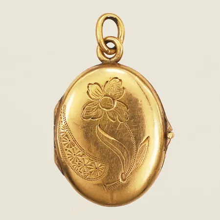 Medaljong med blomma, längd 25mm bredd 16,5mm 18K Vikt: 2 g