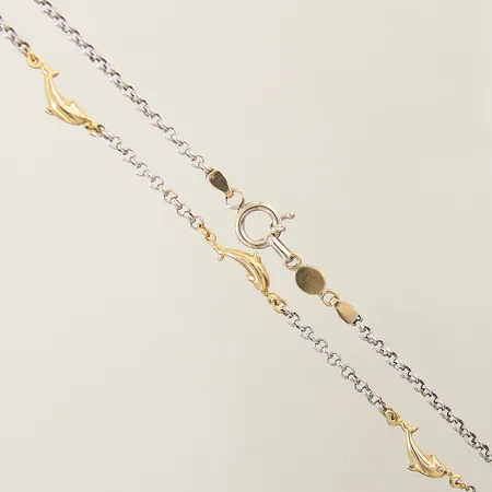 Kedja kullänk med integrerade delfiner längd 41,5cm bredd 2,8-6,8mm delvis vitguld lås med mindre buckla 18K Vikt: 10,7 g