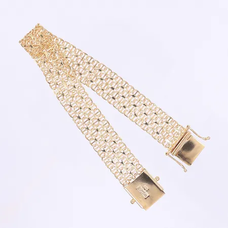 Armband X-länk med stav GHA längd 19cm, bredd 12mm, kistlås, 18K Vikt: 20,7 g