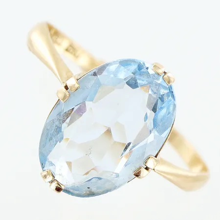 Ring stl:17½ bredd 1-12mm, blå sten 8,5-11,5mm, 18K Vikt: 2 g