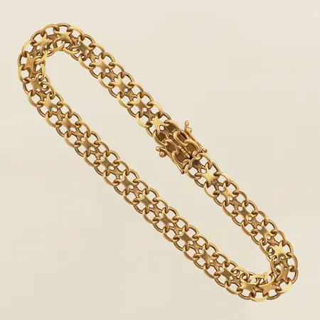 Armband X-länk längd 18,5cm, bredd 6,7mm, Norens Guldatelje år 1967 18K Vikt: 11 g