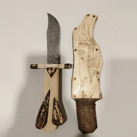 Samekniv med slida i renhorn 26cm behov av slipning gravyr på slidan.