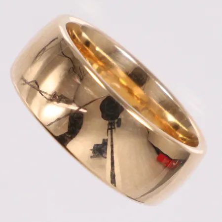 Ring slät stl:15 bredd 7mm 18K Vikt: 8,9 g