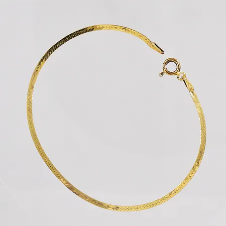 Armband längd 18,5cm bredd 1,8mm förgyllt silver 925/1000 Vikt: 1,2 g på auktion i Västerås hos Pantbanken Sverige