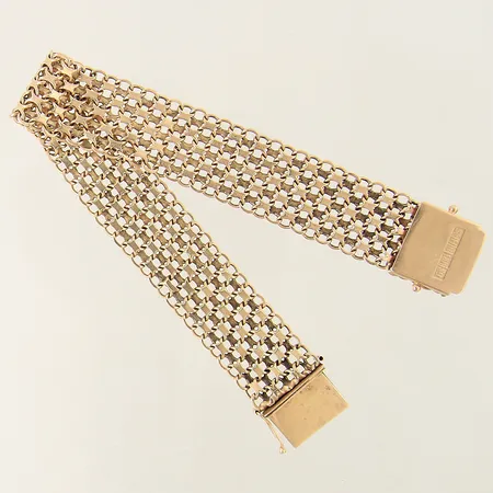 Armband X-länk längd 20cm bredd 17,1mm en låsåtta saknas en skev länkbit 18K Vikt: 32,8 g