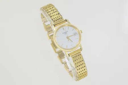 Damur Tissot guldboett diam 23 mm med stålarmband, 18K bv 26,9 på auktion i Växjö hos Pantbanken Sverige