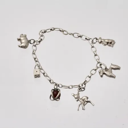 Armband 17,5cm ankarlänk, bredd 4,2mm, 6st berlocker, saknar lås, 830/1000 silver, 8,93g.
