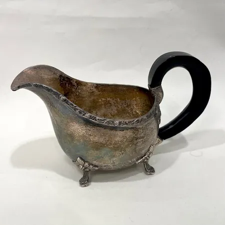 Såssnipa med svärtat handtag Nils Mattsson rokokostil höjd 11,5cm silver 830/1000 Vikt: 289 g på auktion i Solna hos Pantbanken Sverige