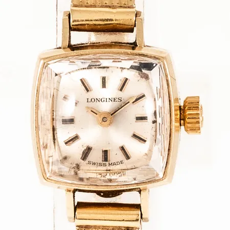 Damur Longines guld 18K manuell 15x15mm, safirglas, halvstelt urband 18K total längd 17,5/18cm bredd 5-6,5mm, bruttovikt 23,0g. 