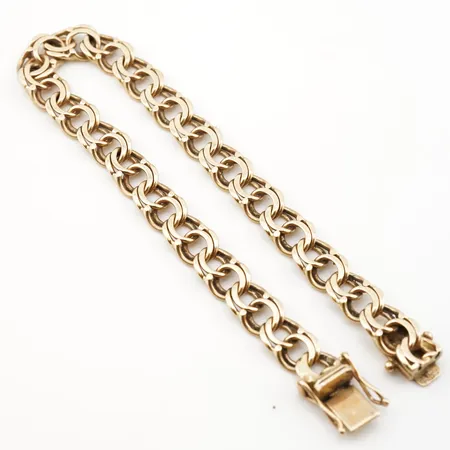 Armband, bismarck, 17,5cm, bredd 7mm, 18k Vikt: 12,4 g på auktion i Helsingborg hos Pantbanken Sverige