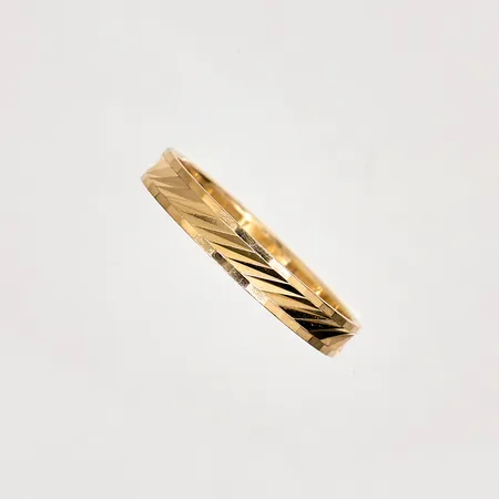 Ring med mönster stl 16¾, bredd 3mm, stämplad BÖS, 18K Vikt: 1,9 g