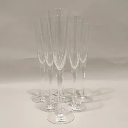 Sex champagneglas Line formgivna av Anna Ehrner Kosta Boda fem med etikett, ca Ø5,2cm, höjd 23,5cm  Skickas med postpaket.