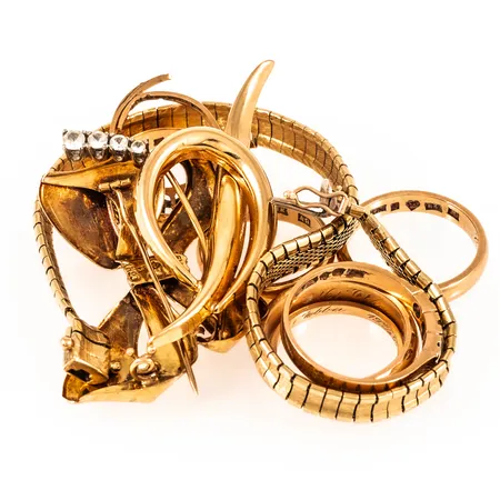 Diverse defekt/graverat guld 18K 52,3g. 