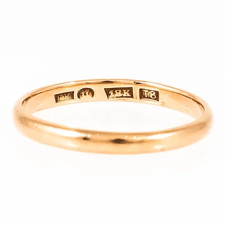 Ring slät stl:22¼ bredd 3mm, något skev, 18K 4,0g. 