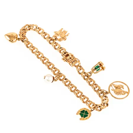 Armband Bismarck med 6 berlocker längd 19cm bredd 5,3mm, hjärta saknar sten, bur bucklig, 18K 16,0g. 