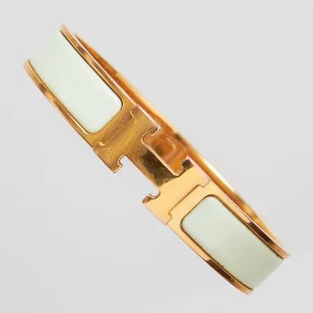 Armband Hermés Clic H mint innermått ca: 58x50mm, bredd: 11,5mm, emalj på gulmetall, datum kod: SP 02 32, märkt Hermes Made in France, bruksslitage, repor, etui, box.  Vikt: 0 g