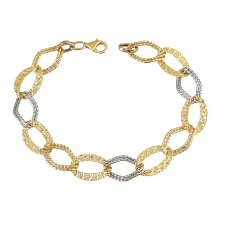 Armband i 14K guld tvåfärgad modell, längd 21,0 cm, bredd 11 mm, fint skick Vikt: 6,3 g