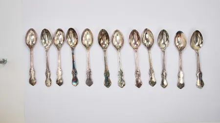 12 Teskedar GAB och MEMA längd: ca 12cm silver 830/1000 Vikt: 200,1 g