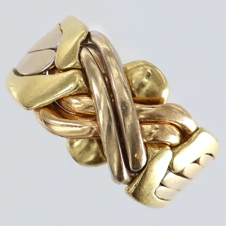 Ring pusselring sex delar stl:19¼ bredd 5,5-13mm tvåfärgat 18K.  Vikt: 13 g