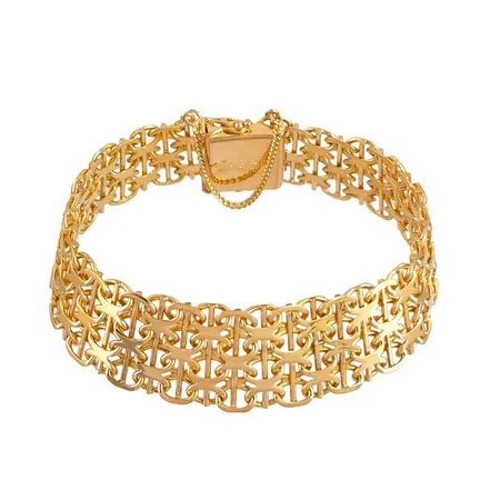 Armband X-länk med stav i 18K guld, Bröderna Hedens Guldatelje (BHG), Stockholm, svensk kontrollstämpel, inre omkrets knäppt 17,0 cm, bredd 17 mm, tjocklek 2 mm, graverat datum och initialer på insticksdelen, fint skick Vikt: 34,5 g