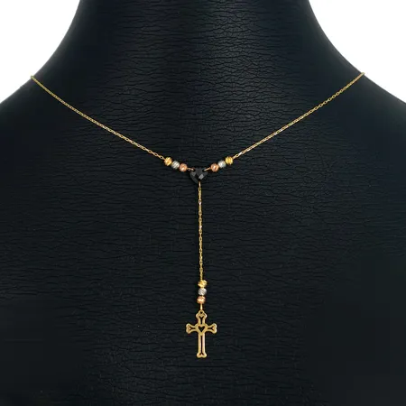 Collier i 14K guld med Kors, trefärgade klot Ø 2,3 mm, hjärtslipad svart sten 5x5x2,5 mm, längd 43,0 - 45,5 cm, kedjans bredd 0,8 mm, det integrerade hängets längd (från den svarta stenens övre kant till korsets nedre del) 52 mm, tillverkarstämpel MK Vikt: 1,6 g