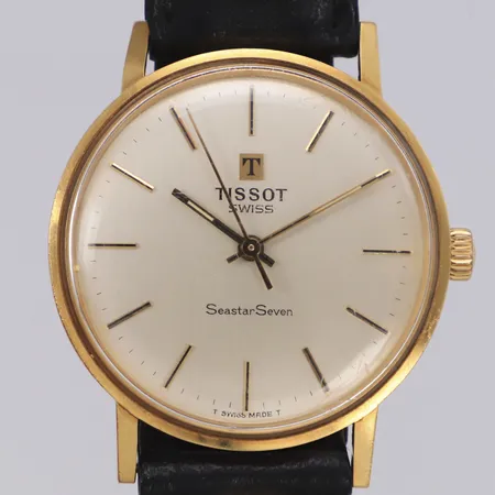 Herrur Tissot Seastar Seven, Ø33,3mm, 18K manuell, repor på glas, gravyr år 1986, originalband i läder