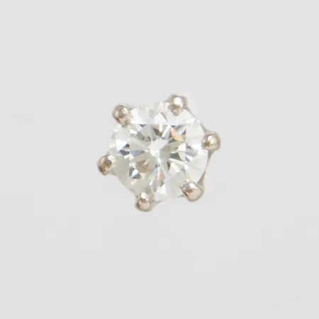 Lös diamant i 18K fattning 1x ca 0,40ct Vikt: 0,3 g