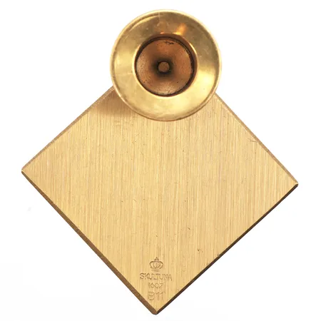 Ljustake Skultuna, formgivare Hans Agne Jakobsson, höjd 2,8cm, bredd 6cm, borstad mässing.