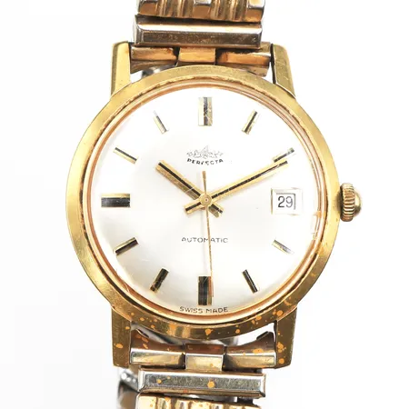 Herur Perfecta 18K, automatic, Ø34mm, flexband i metall, gravyr, bruksslitage på band, repig/skadad boett, repigt plexiglas, tickar vid funktionstest, service behov finns, inga tillbehör.