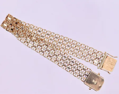 Armband X-länk längd 19 cm bredd 12 mm 18K. Vikt: 15 g
