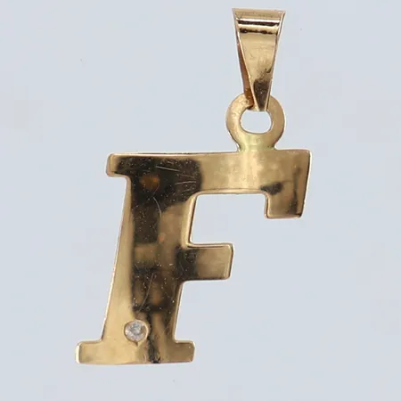 Hänge "F" med diamant 1 x 0,0075ct 18,5x10mm ink ögla 18K.  Vikt: 0,3 g