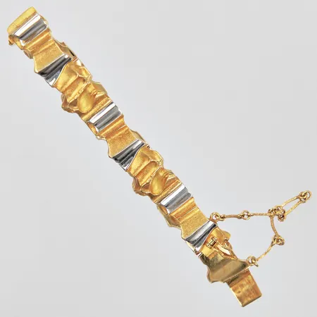 Armband Lapponia Finland år 1992 med säkerhetskedja längd ca 17,6cm bredd ca 6-9mm 18K Vikt: 37,2 g