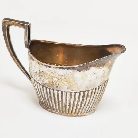 Gräddkanna höjd: 10cm, bredd: 15,5cm, Göteborg, 1918, silver 830/1000 Vikt: 154,1 g