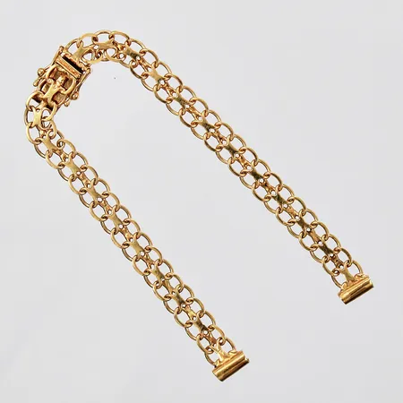 Klockarmband X-länk längd: ca 15,5cm bredd: ca 6mm 18K Vikt: 7,8 g