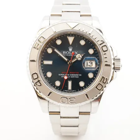 Herrur Rolex Yachmaster 40, Stål /Platina med blå tavla Serie nr: 8L165853, ref: 116622, box & cert Berströms på auktion i Helsingborg hos Pantbanken Sverige
