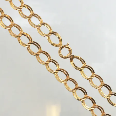 Collier, längd ca 48cm, bredd ca 14mm, ojämnheter på länken, 21K. Vikt: 21,6 g