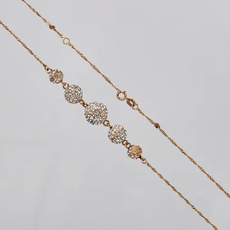 Collier med vita stenar längd: ca 40,8-44cm bredd: ca 1mm Ø ca 7-10mm saknar stenar GHA 18K Vikt: 4,2 g
