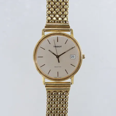 Herrur Tissot seastar 18K, quartz, Ø35mm, datum, gravyr, batteribyte behövs, länk i 18K inga tillbehör, bruttovikt:41,9g