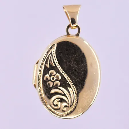 Hänge medaljong stl:23x13 mm 18K. Vikt: 1,3 g