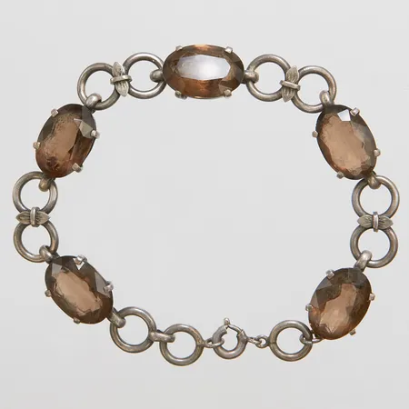 Armband med rökkvarts längd: 21cm, bredd: 10mm, silver 835/1000 bruttovikt 22,6g.